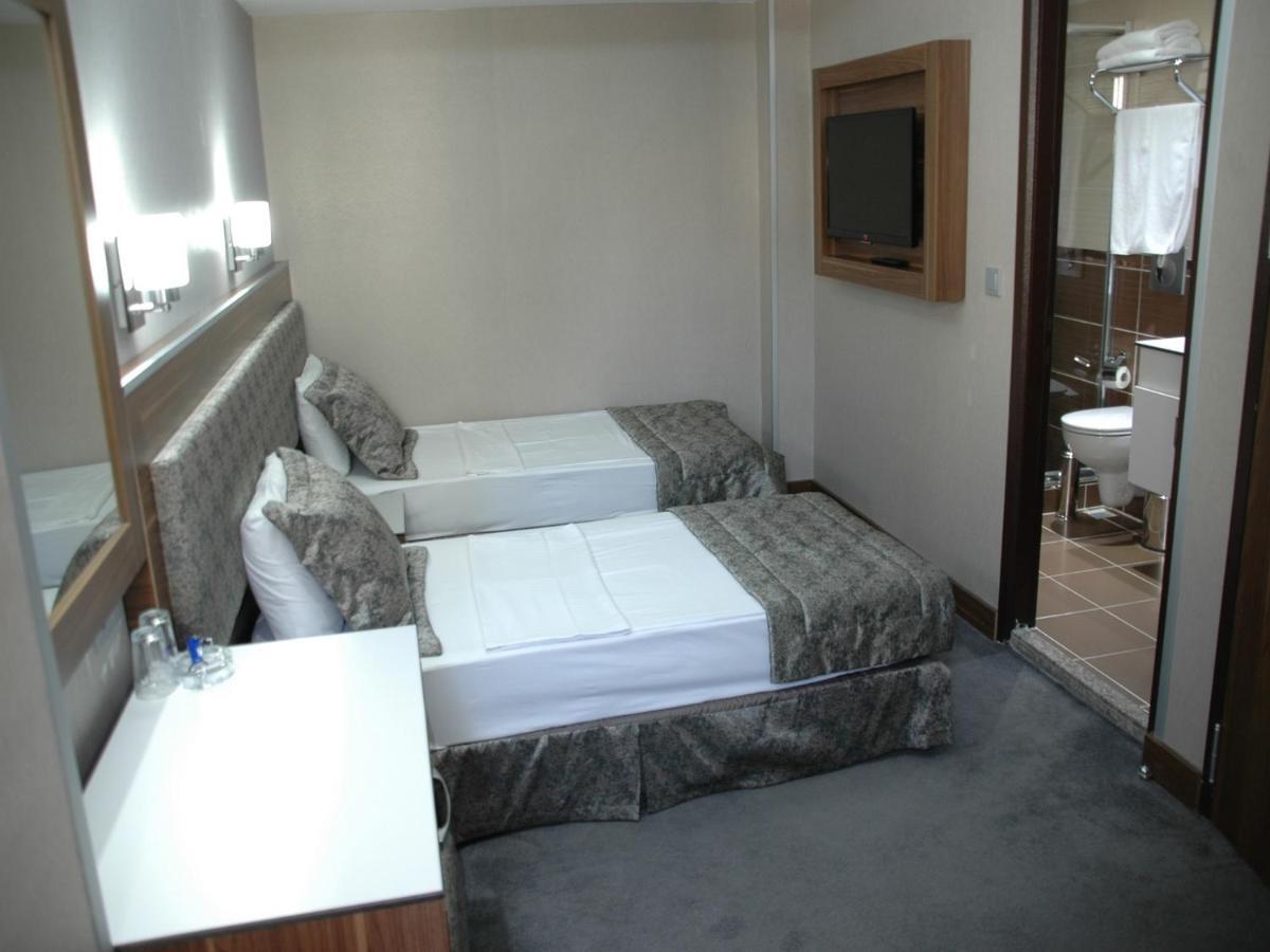 Hotel Buyuk Paris Истанбул Стая снимка