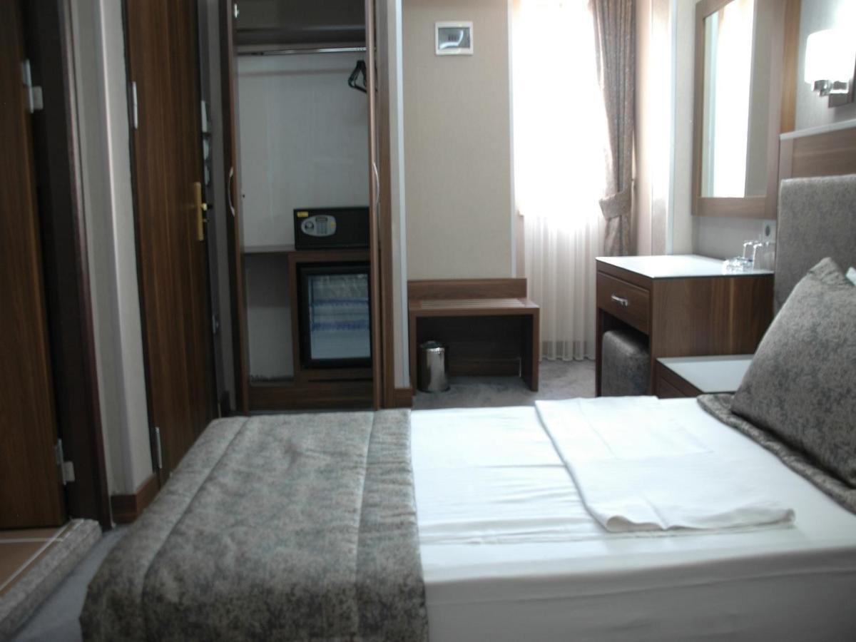 Hotel Buyuk Paris Истанбул Стая снимка